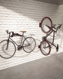 BIKETEC WIESZAK ŚCIENNY NA ROWER (WALL BIKE RACK) STAL MALOWANA PROSZKOWO KOLOR CZARNY, PLASTIK CZERWONY BIKETEC OM