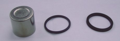 TOURMAX TŁOCZEK ZACISKU HAMULCOWEGO Z USZCZELNIACZAMI HONDA CR 80/85 '92-'07, CBR 600F1 - TYŁ (MADE IN JAPAN)